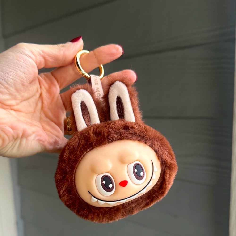 The Monsters brown furry keychain bag charm monster